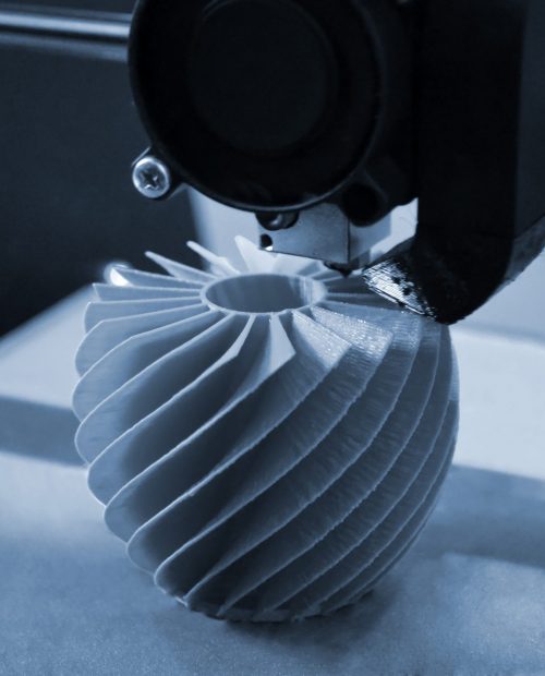 3D printer working and creating an object from the hot molten plastic close-up. Automatic three dimensional 3d printer performs plastic blue colors modeling in laboratory. Blue gray color